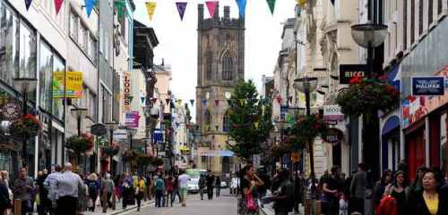 This is a shot of Bold Street, my favorite street in the city.  It's not where the chain stores or the posh stores are.  Most are locally owned artisan stores, and there are a lot of really good restaurants here.  My favorites: Kashbah, Leaf, The Custom Cupcake Company, and Passage to India.  Photo by Catherine Cavendish.